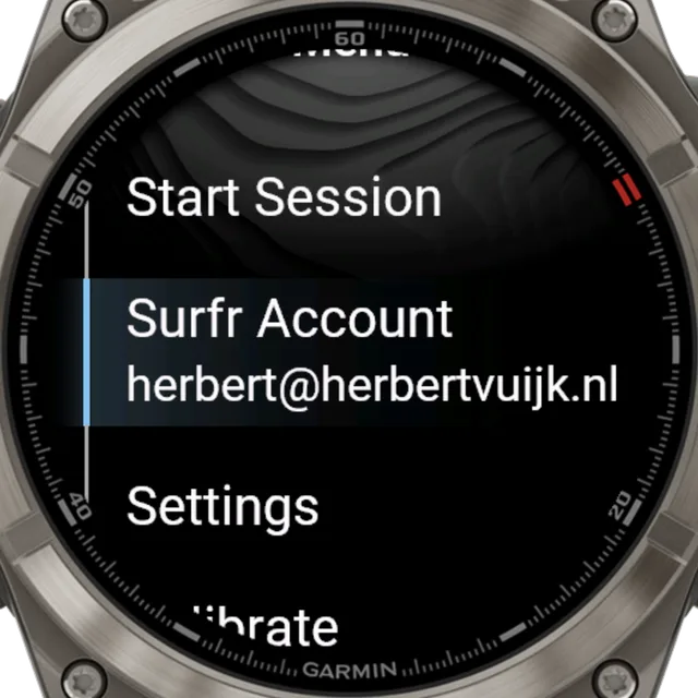 Garmin watch showing the Surfr main menu with the linked Surfr account and its email address