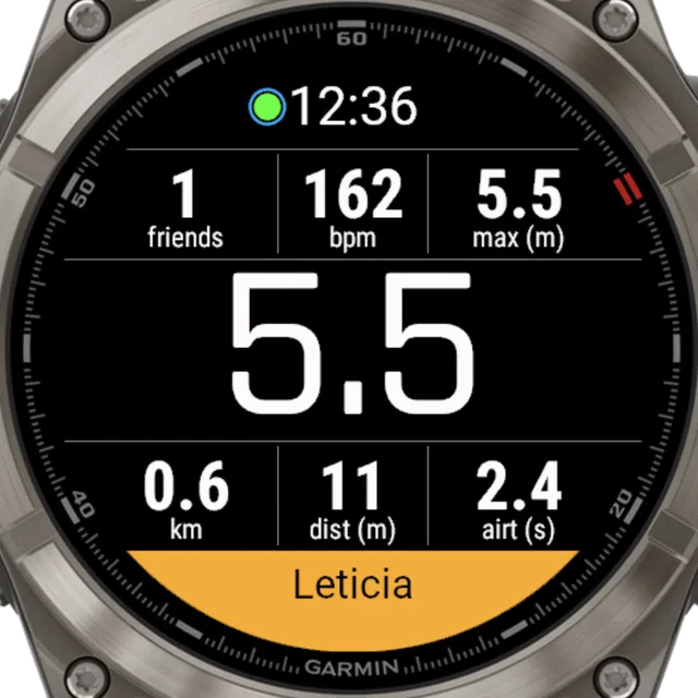 Garmin watch recording a session with a friend alarm banner showing the name Leticia